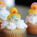 gender reveal cupcake with rubber ducky