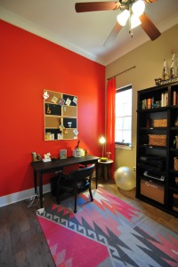 craft room with orange wall